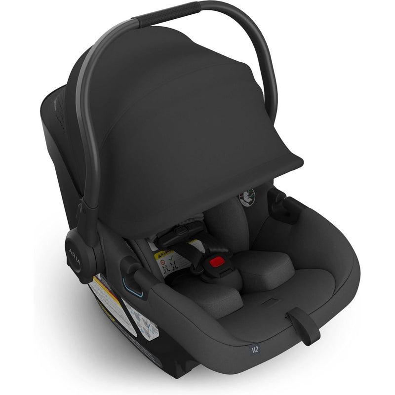 Three-quarter angle of the Uppababy Aria V2 in Jake highlights the durable frame of this best car seat for newborns.
