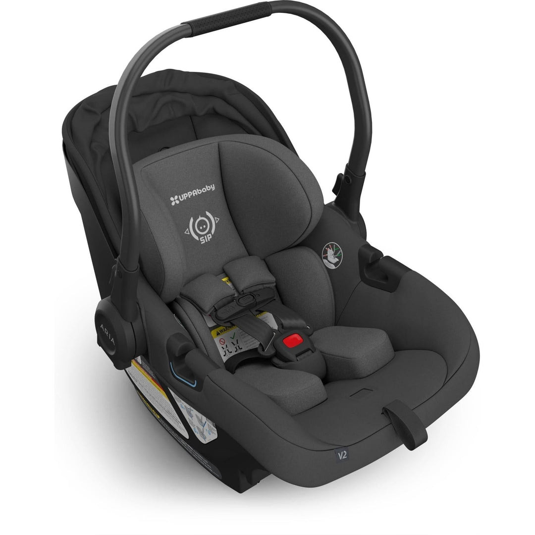 With its canopy lowered, the Uppababy Aria V2 in Jake delivers everyday convenience in a reliable rear facing car seat.