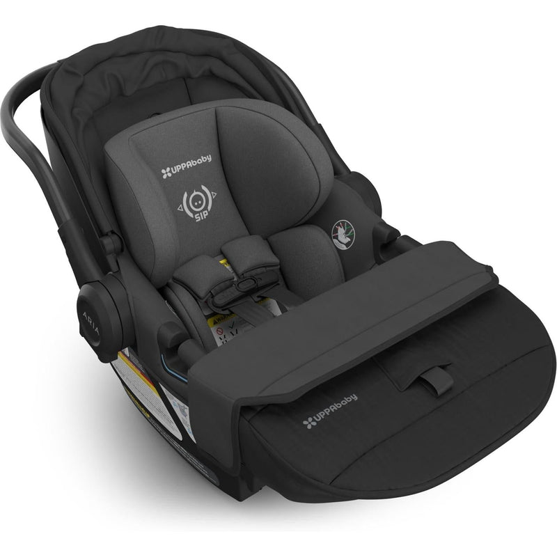 Compact and stylish, the Uppababy Aria V2 in Jake features a folded foot cover for quick, portable travel use.