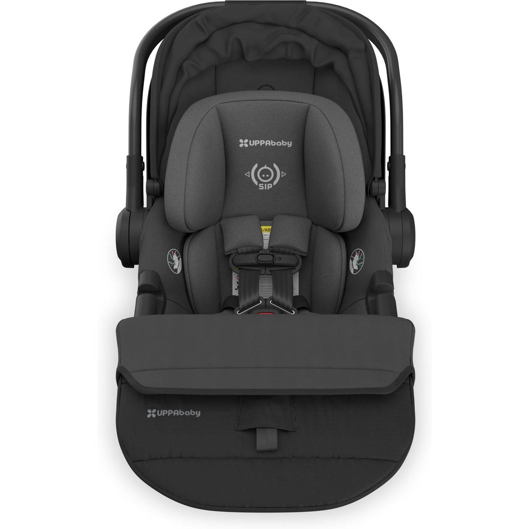 Aerial shot of the Uppababy Aria V2 in Jake with folded cover, combining function and aesthetics in a best baby car seat.