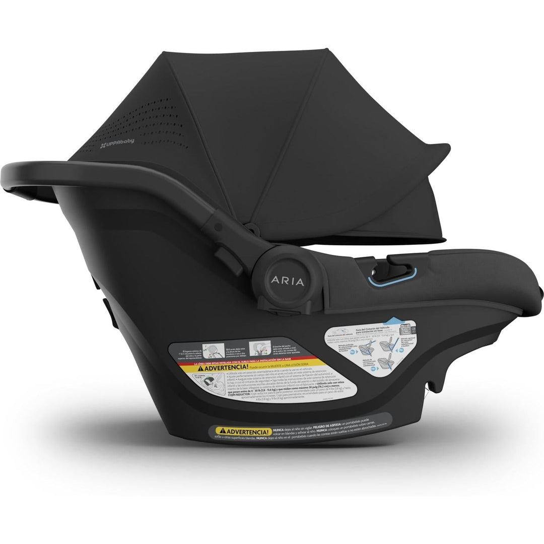 With sunshade expanded, the Uppababy Aria V2 in Jake keeps little ones cool and safe in this trusted infant car seat.