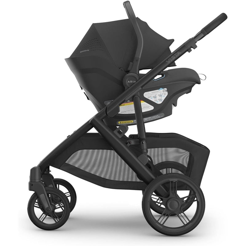 Side profile of the Uppababy Aria V2 Infant Car Seat in Jake shows sleek contours and reliable rear facing car seat design.