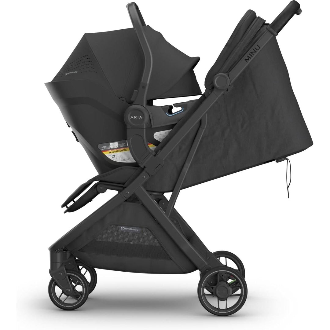 Uppababy Aria V2 Infant Car Seat in Jake attached to Minu stroller side view, perfect for busy families.