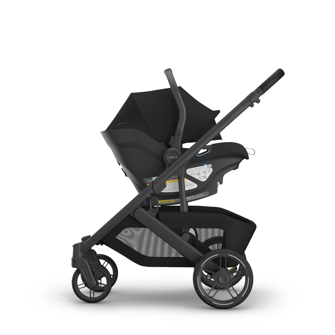 Aria V2 James Black on Cruz V3 side view — UPPAbaby all-black infant seat compact stroller system