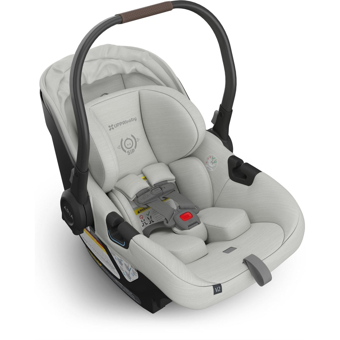 Uppababy Aria V2 Infant Car Seat in Savannah shown canopy down, a stylish and secure choice for baby car seats.
