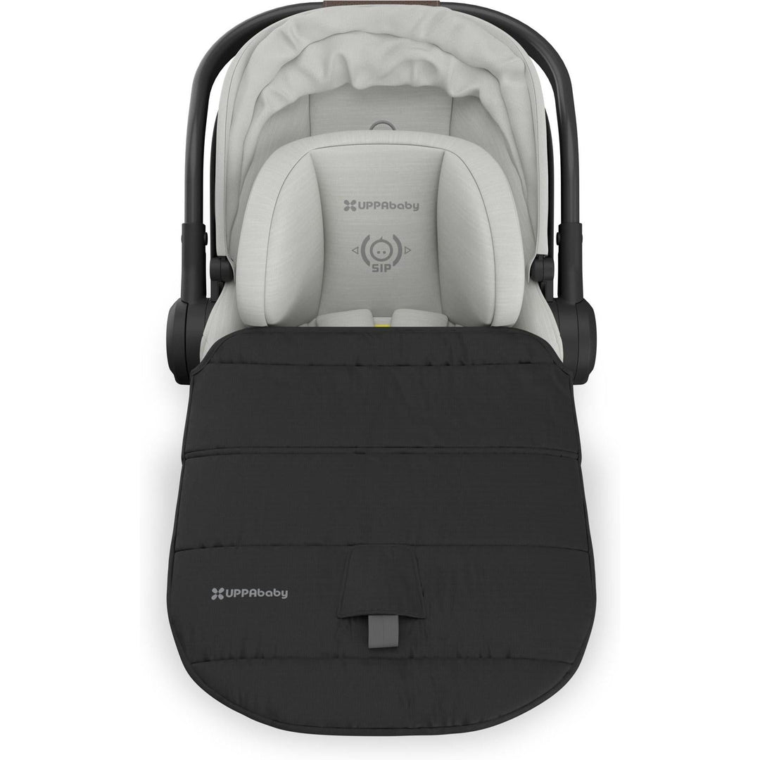 Top angle of the Uppababy Aria V2 Infant Car Seat in Savannah with full foot cover attached, ideal for cozy travel days.