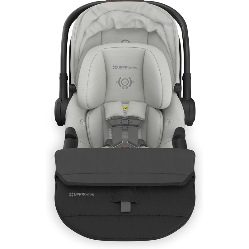 From above, the Uppababy Aria V2 in Savannah with folded foot cover presents a sleek, portable baby car seat option.