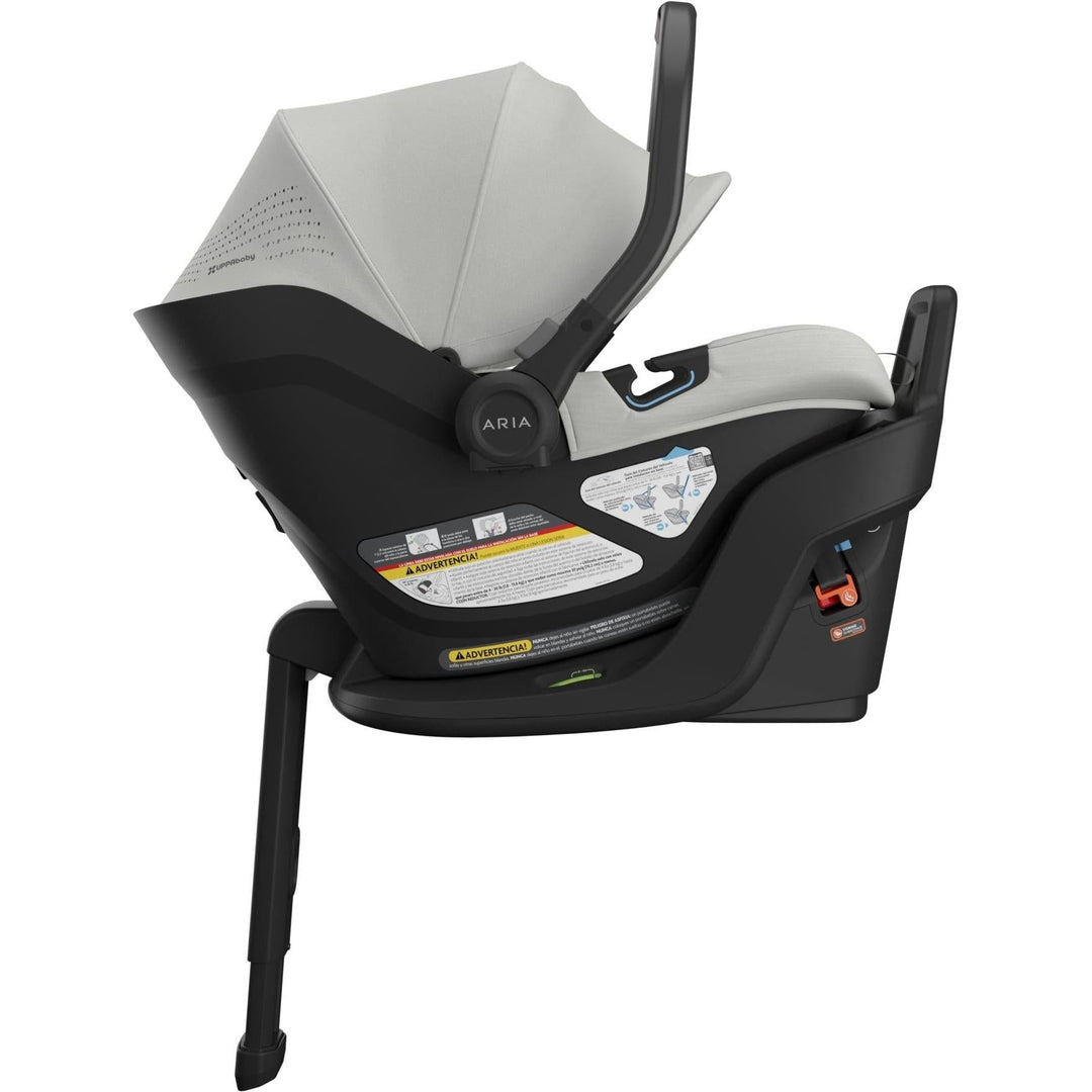 Left-side view of Uppababy Aria V2 in Savannah, displaying elegant contours and superior newborn car seat protection.