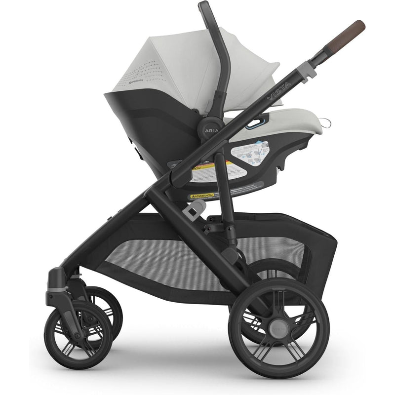 Adjustable leg rest lengths on the Uppababy Aria V2 Infant Car Seat in Savannah ensure comfort as your baby grows.