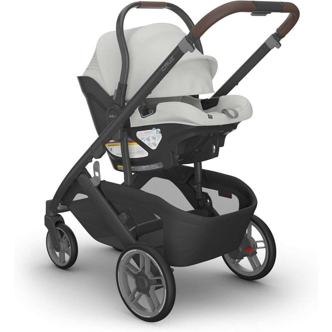 Savannah Uppababy Aria V2 Infant Car Seat connected to Cruz stroller, a stylish and secure baby car seat for daily use.
