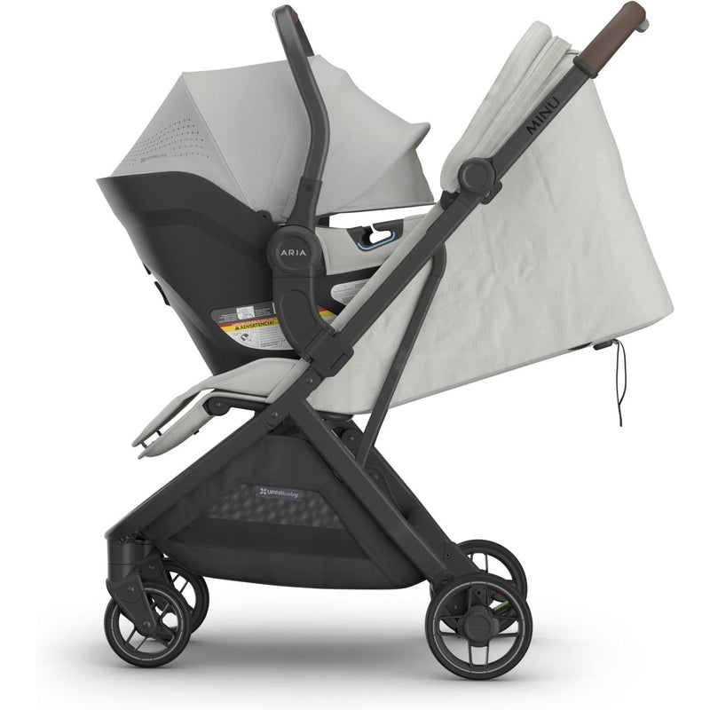Side profile of the Uppababy Aria V2 Infant Car Seat in Savannah on Minu stroller, ideal for families needing a good travel car seat.
