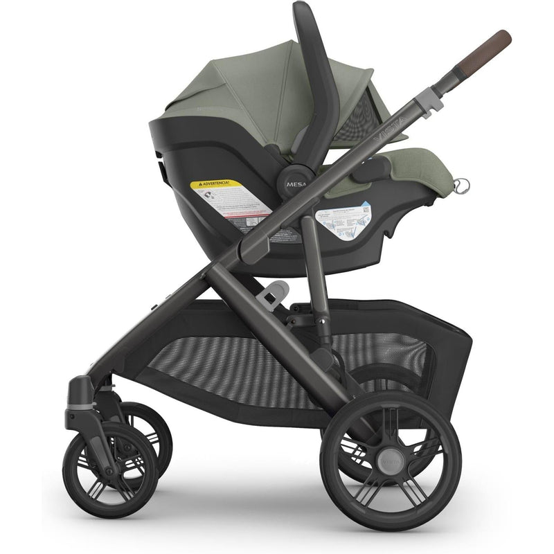 Evelyn Uppababy Aria V2 Mesa Base connection with Vista stroller side view, the ultimate car seat baby setup for families.