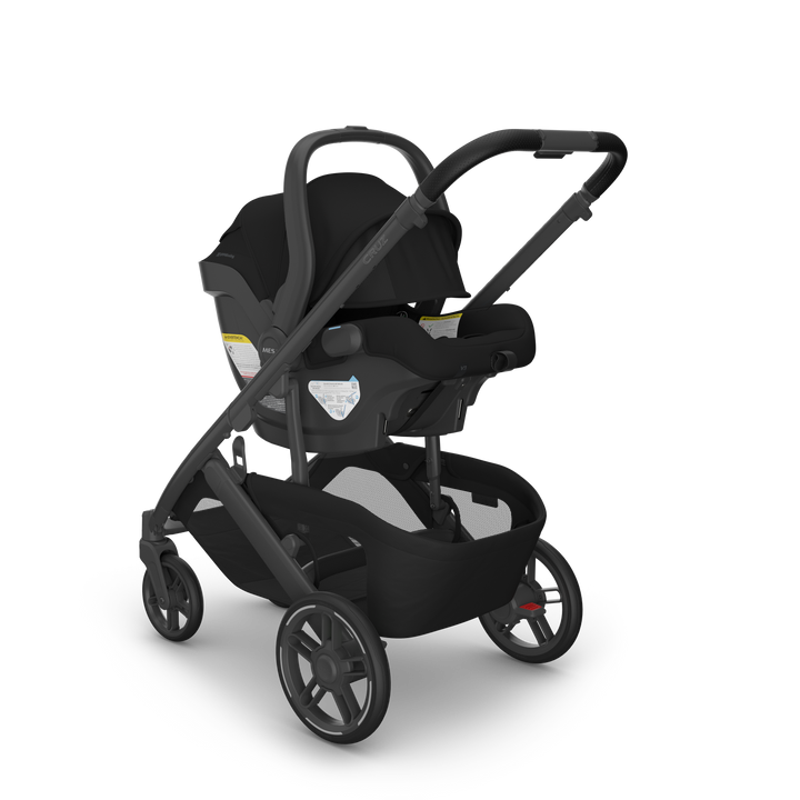 Mesa V3 James Black on Cruz V3 front — UPPAbaby all-black infant car seat compact stroller bundle