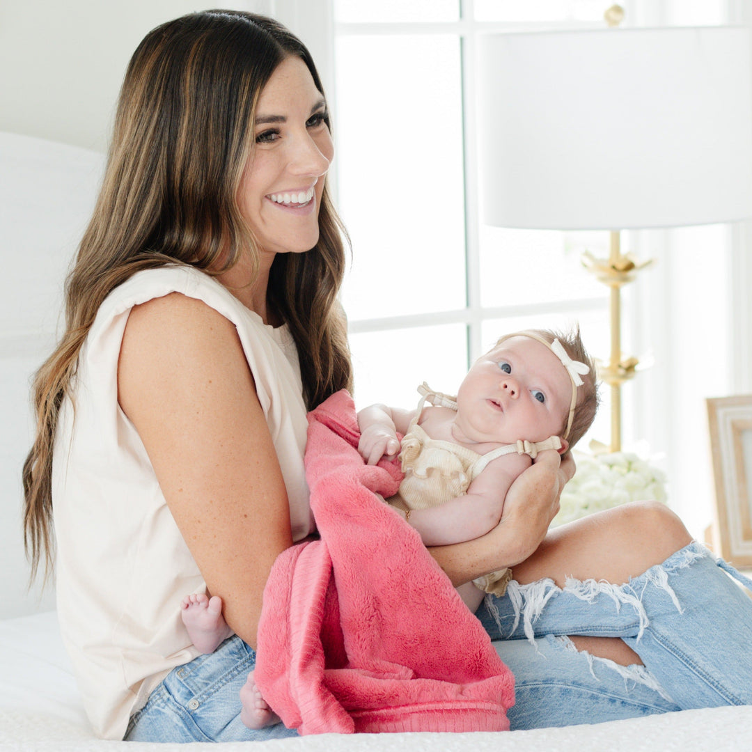 The Primrose Saranoni Lush Receiving Blanket keeps little ones wrapped in warmth, a top baby boy blankets.