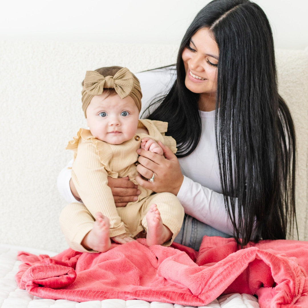 Primrose brings a subtle comfort from the Saranoni Lush Mini Blanket that functions beautifully as a staple baby blanket.