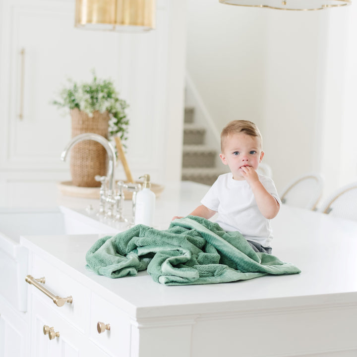 Keep infants cozy in Seagrass Saranoni Lush Receiving Blanket, ideal as a baby boy blanket for comfort.