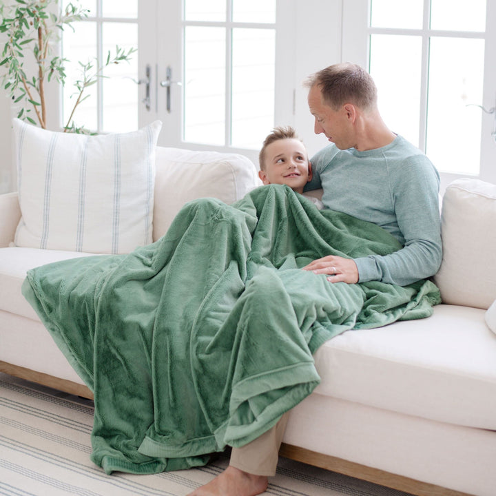 The Saranoni Lush Toddler Blanket in Seagrass offers plush softness as a soft baby blanket.