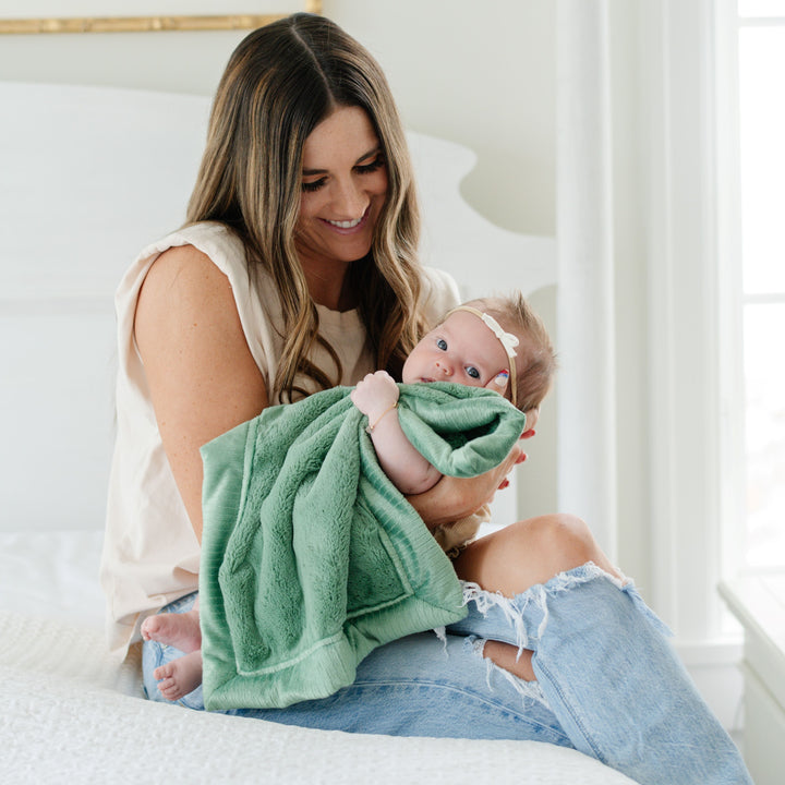 Saranoni Lush Mini Blanket in Seagrass wraps baby in soft warmth, perfectly aligned with everyday baby blankets use.