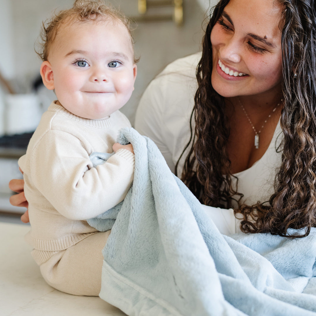 Wrap your infant in Chambray Saranoni Lush Receiving Blanket, perfect as infant receiving blankets.