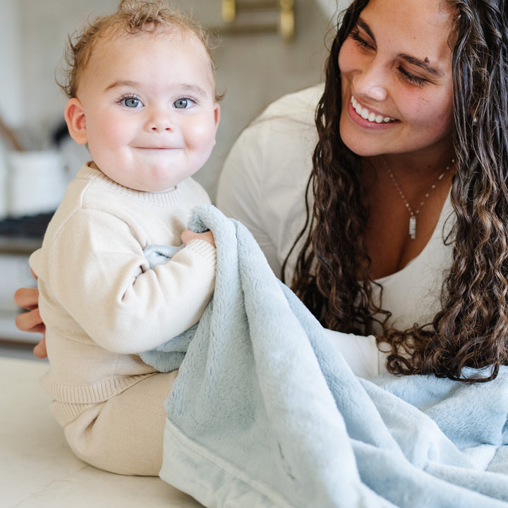 Wrap your infant in Chambray Saranoni Lush Receiving Blanket, perfect as infant receiving blankets.