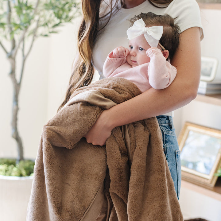 Keep little ones warm in the Hazlenut Saranoni Lush Receiving Blanket, ideal as baby receiving blankets.