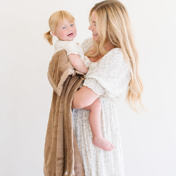 Saranoni Lush Toddler Blanket in Hazelnut provides plush softness, serving as a best blankets for toddlers pick.