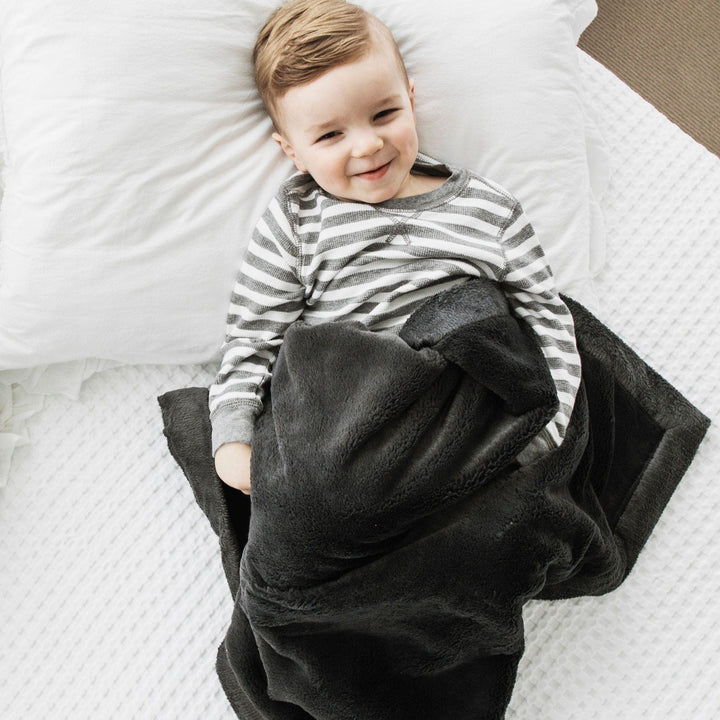 The plush Charcoal Saranoni Lush Receiving Blanket keeps newborns warm, perfect as receiving blankets.