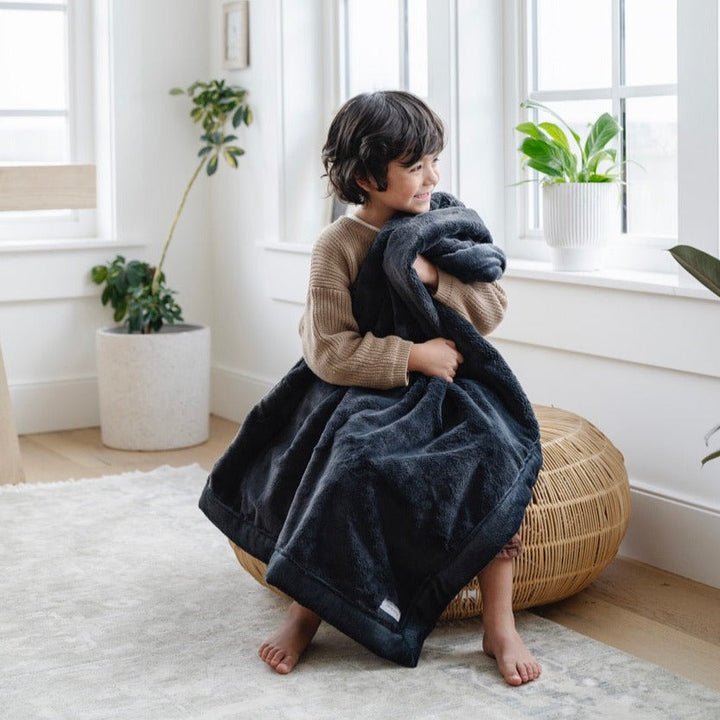 Snuggle little ones in the Charcoal Saranoni Lush Receiving Blanket, a soft receiving blanket for cozy naps.
