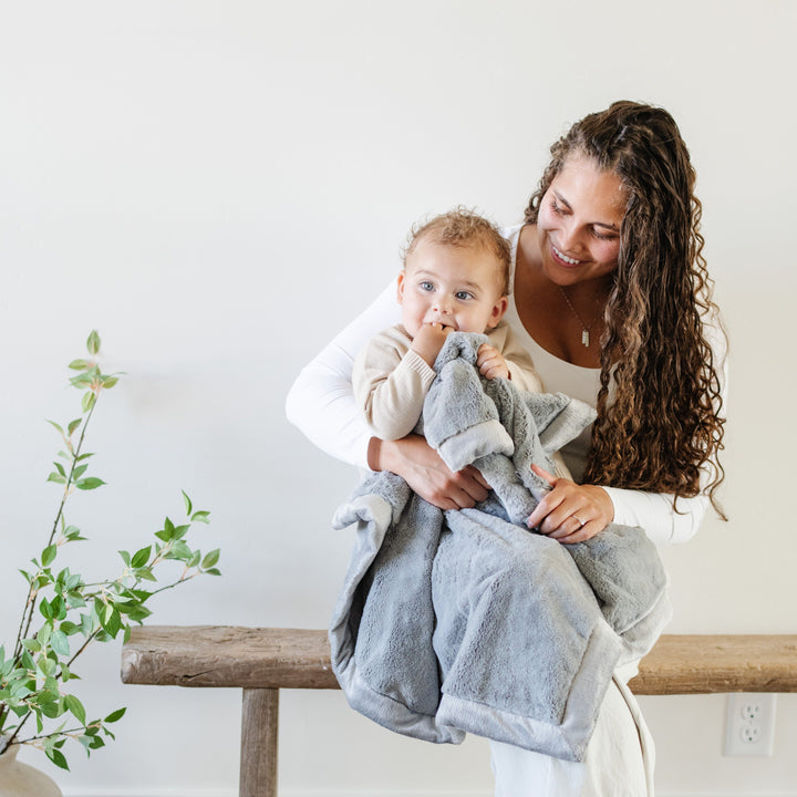 Wrap babies in the Gray Saranoni Lush Receiving Blanket, perfect for comfort as a newborn receiving blanket.