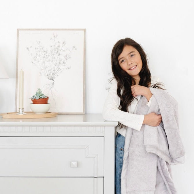 The Saranoni Lush Toddler Blanket in Feather feels ultra cozy, making it one of the best baby blankets for everyday snuggles.