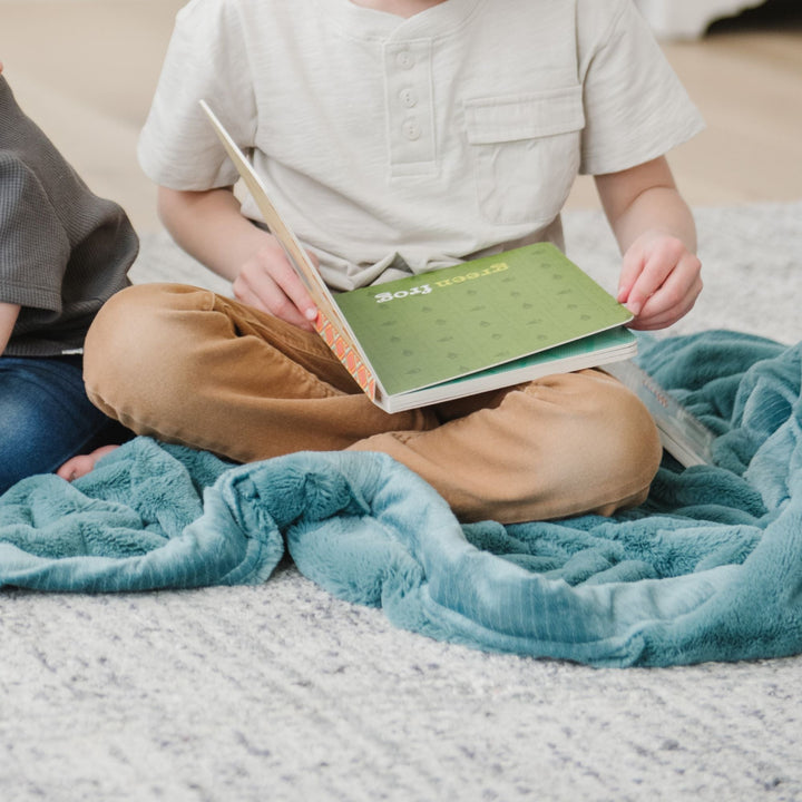 Softness takes center stage with Saranoni Lush Mini Blanket Mineral Blue perfect for curated baby girl blankets styling.