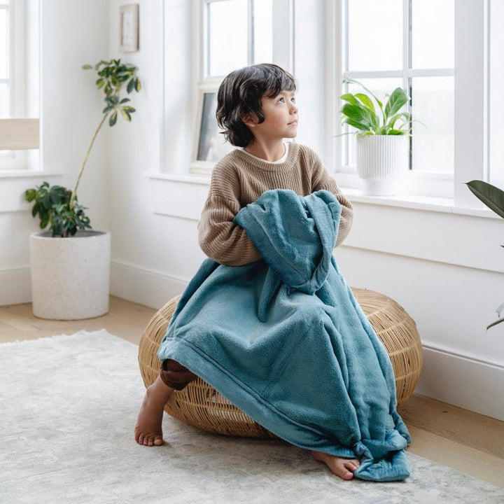 The Mineral Blue Saranoni Lush Receiving Blanket offers cozy warmth, ideal for infant receiving blankets.