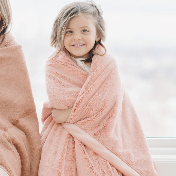 Blossom proves how the Saranoni Lush Mini Blanket can feel truly cloudlike, earning its place among soft baby blankets.