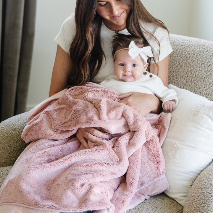 Wrap little ones in the Ballet Slipper Saranoni Lush Receiving Blanket, a cozy choice among infant receiving blankets.