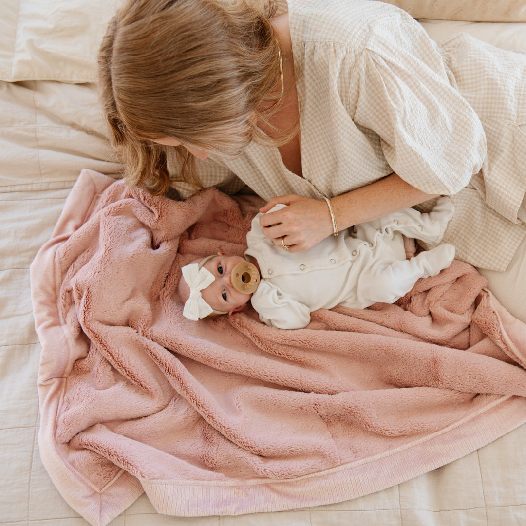 Soft Ballet Slipper Lush Receiving Blanket from Saranoni is perfect for snuggles, a top newborn receiving blanket.