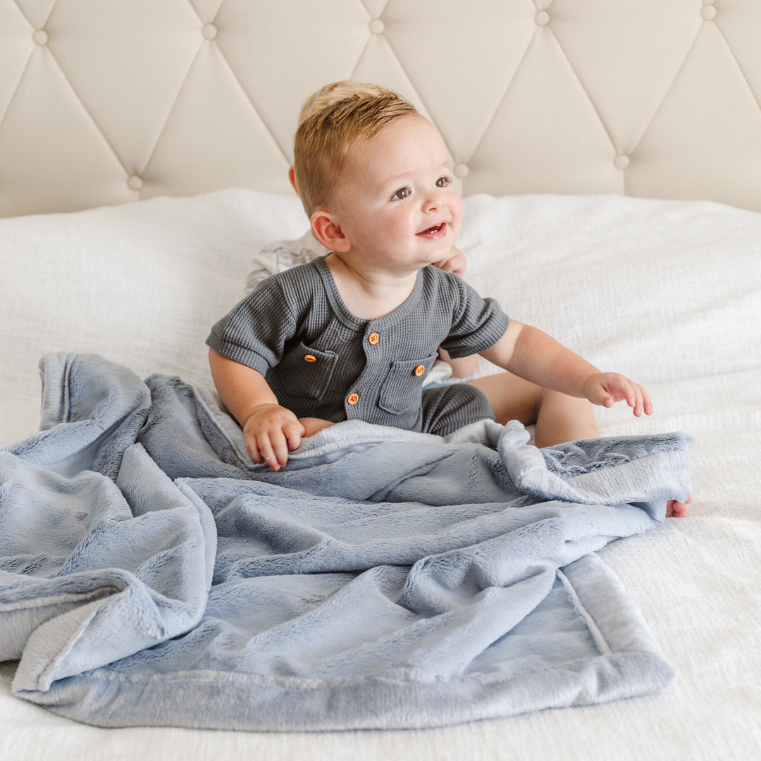 The Storm Cloud Saranoni Lush Receiving Blanket is lightweight, perfect for travel as soft baby blankets.