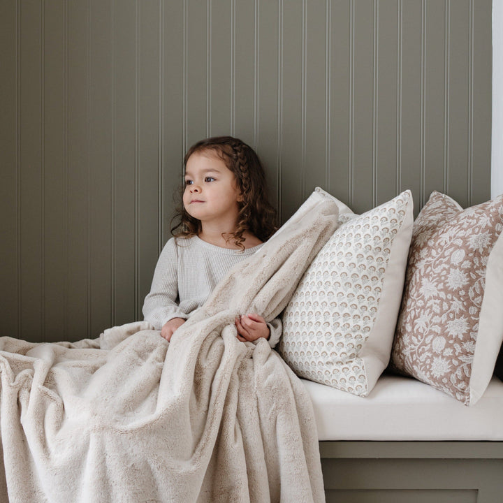 Saranoni Lush Toddler Blanket in Buttermilk offers a soft toddler blanket perfect for naps and play.