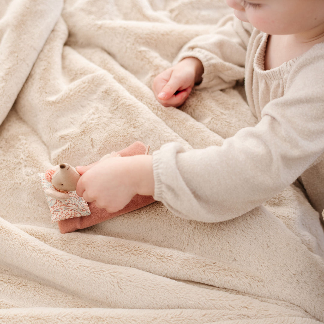 Cozy Buttercream Saranoni Lush Receiving Blanket wraps infants in warmth, a top baby blanket choice.