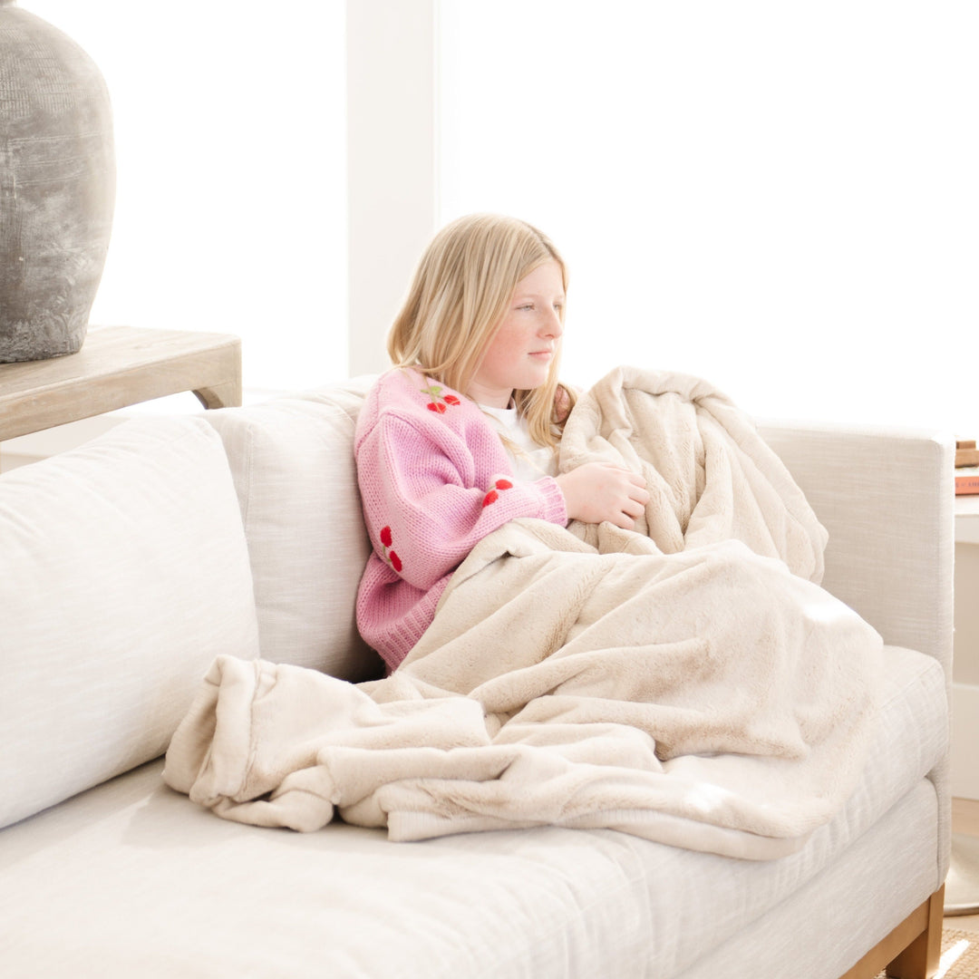 Saranoni Lush Toddler Blanket in Buttermilk wraps toddlers in comfort as a best blanket for toddler use.