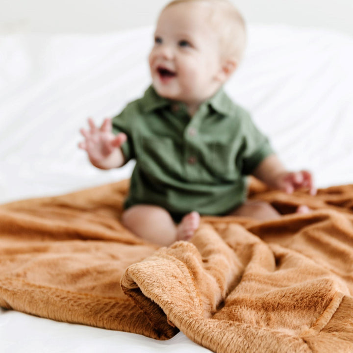 Ultra-soft Camel Lush Receiving Blanket by Saranoni provides cozy comfort, ideal as baby boy blankets.