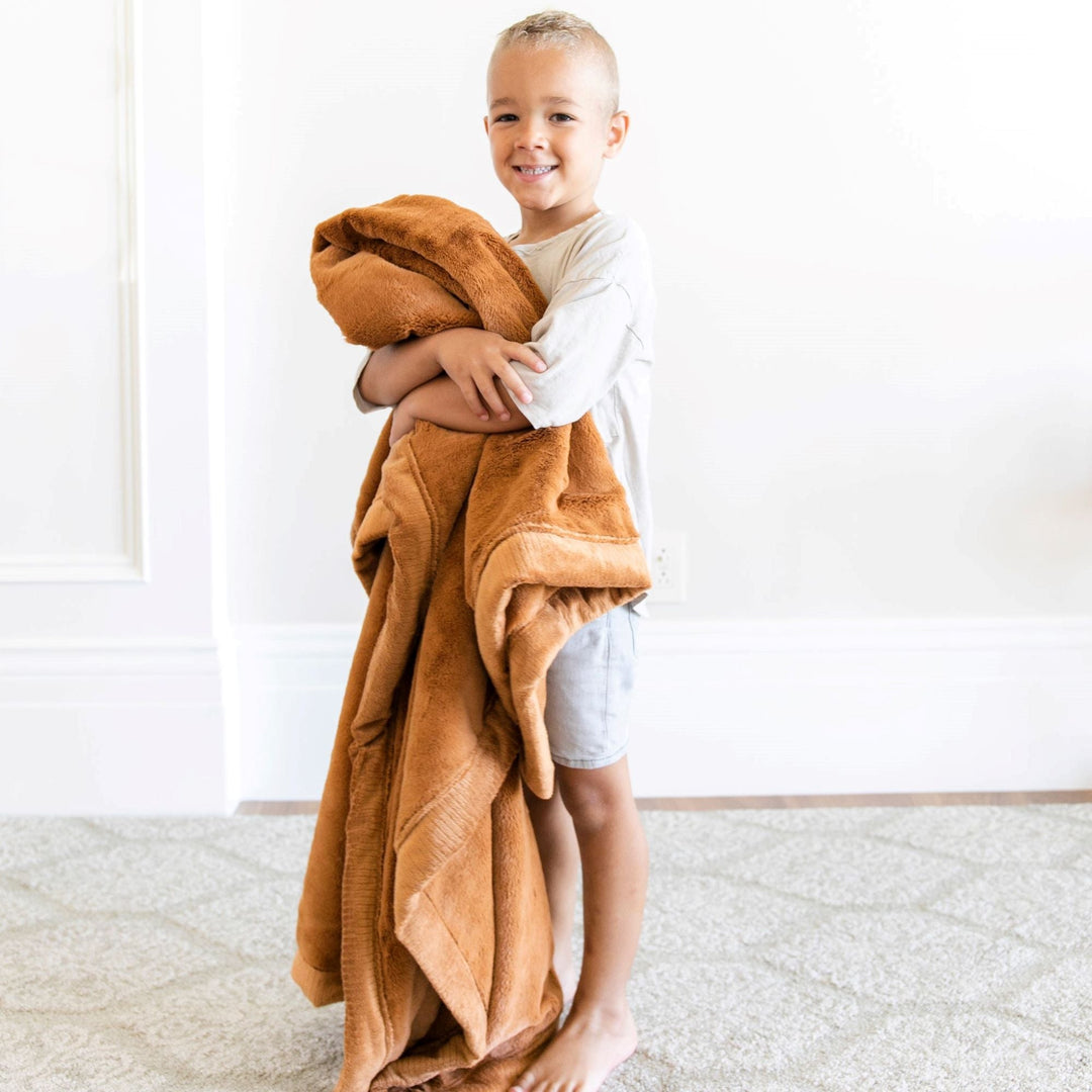 Cuddles feel different with the Saranoni Lush Toddler Blanket in Camel, crafted for best blanket for toddler use.