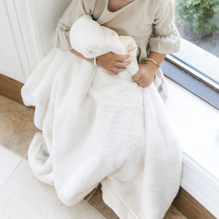 The Natural Saranoni Lush Receiving Blanket is perfect for snuggling, a top best baby blanket.