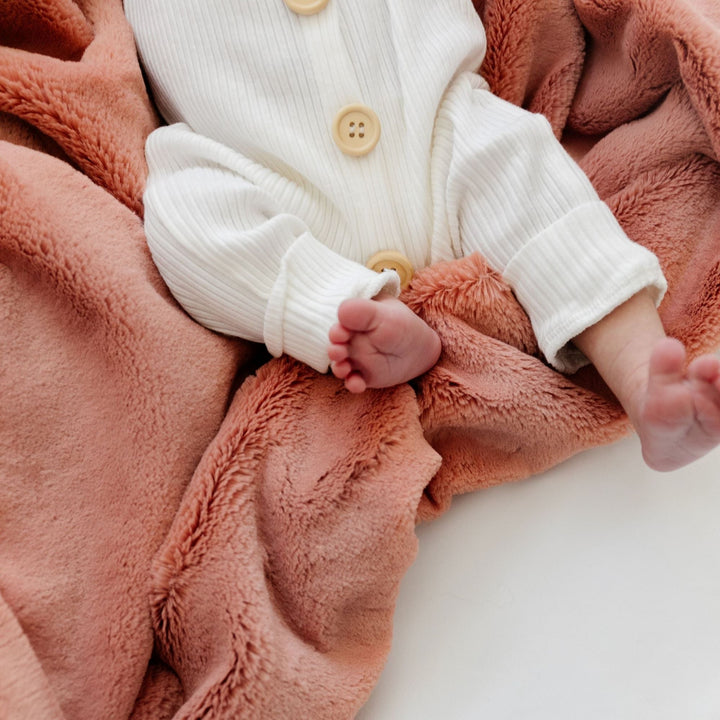 This Saranoni Lush Mini Blanket in Clay offers premium plush that ranks high for Best baby blanket gifting.