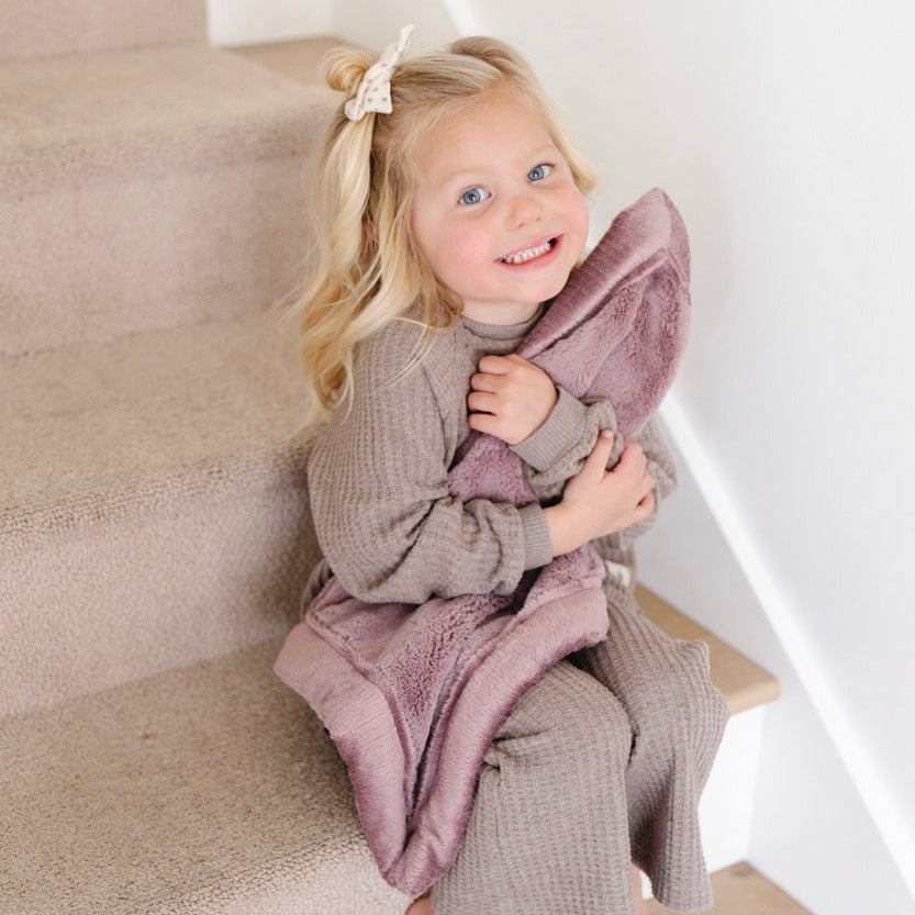 Parents reach for the Saranoni Lush Mini Blanket in Bloom because it delivers elevated softness in baby girl blankets.