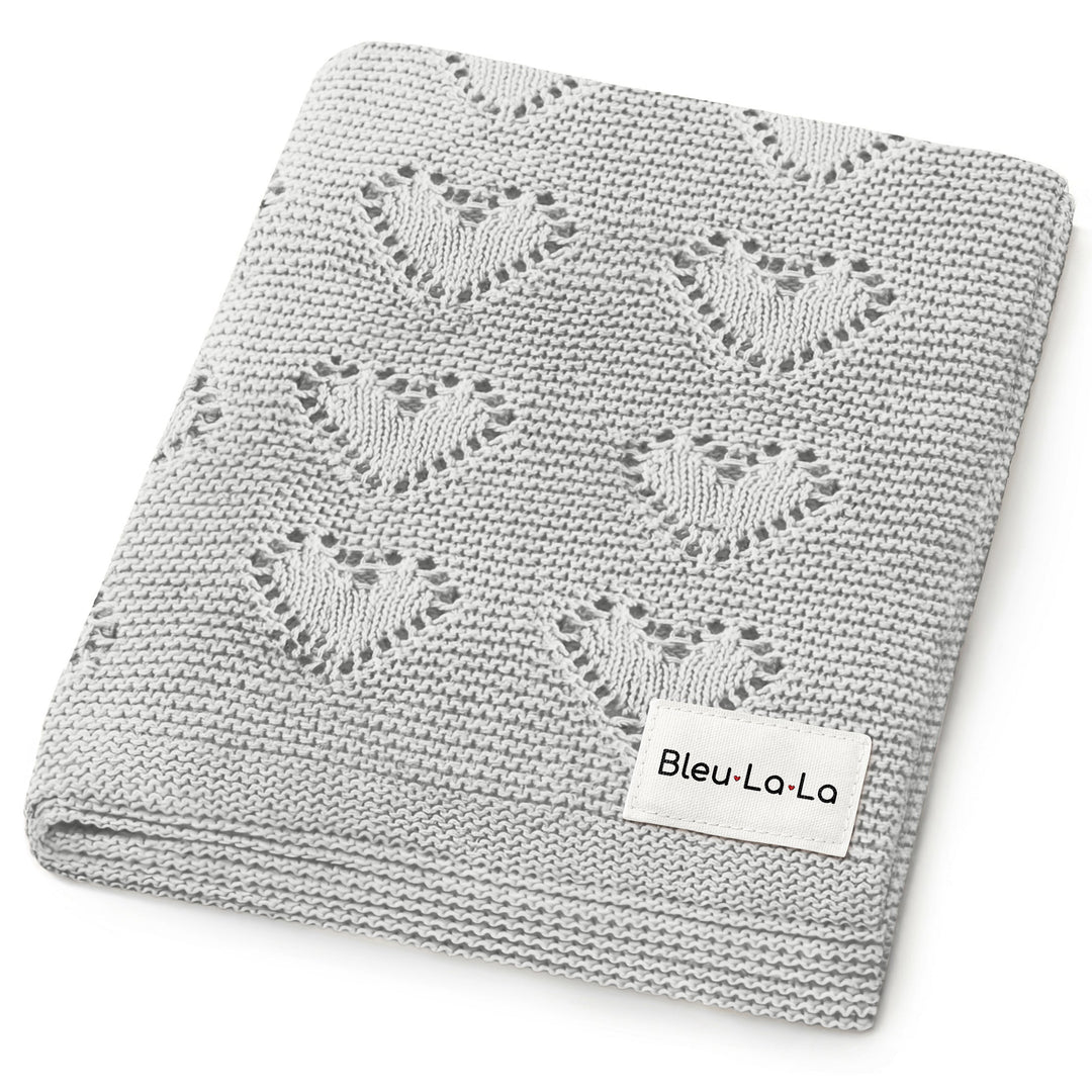 Bleu La La 100% Cotton Luxury Knit Heart Swaddle Baby Blanket in grey, folded with heart pattern for timeless nursery style.