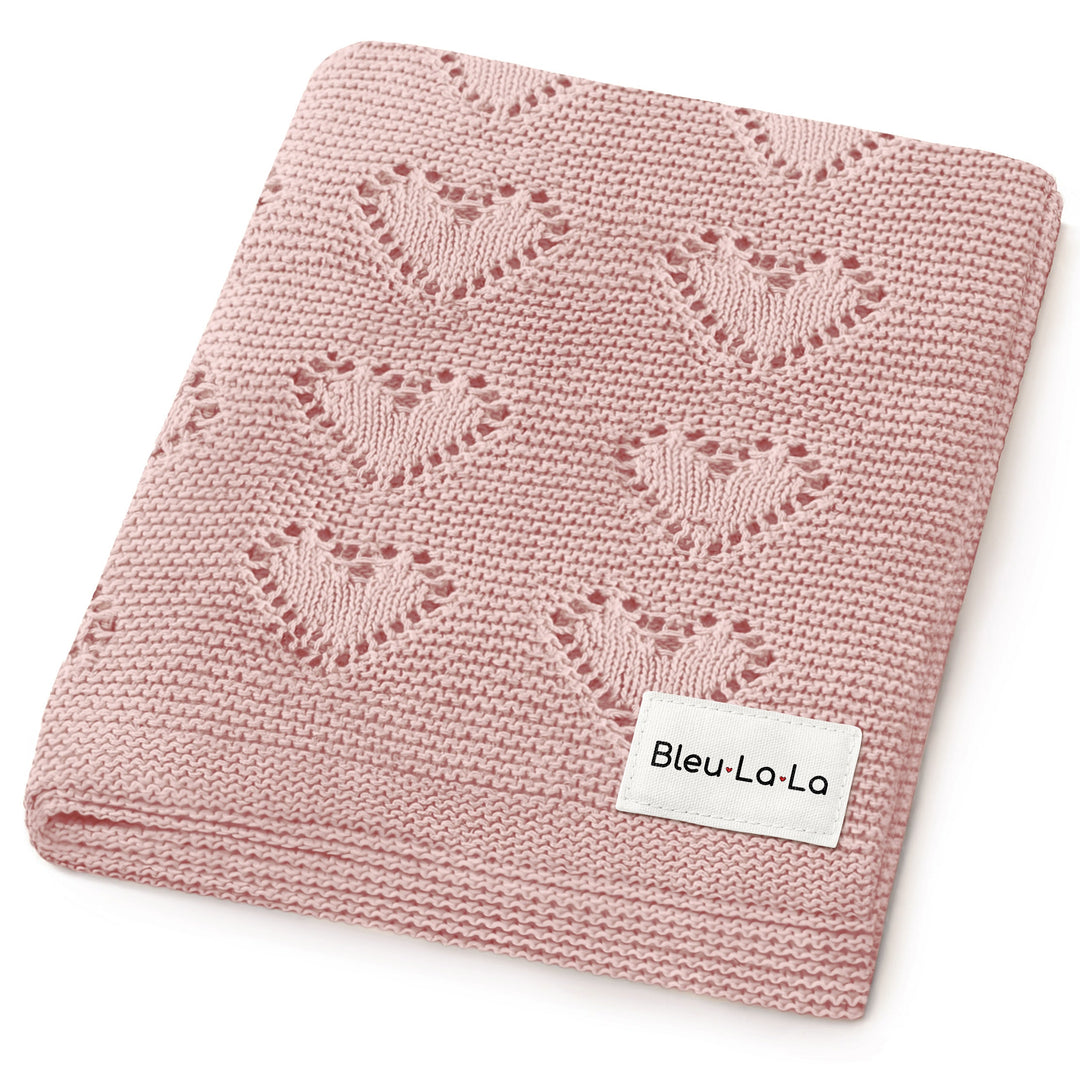 Bleu La La 100% Cotton Luxury Knit Heart Swaddle Baby Blanket in rose pink, folded to showcase soft heart knit texture.