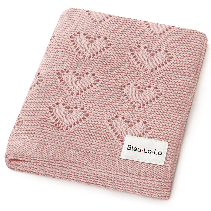 Bleu La La 100% Cotton Luxury Knit Heart Swaddle Baby Blanket in rose pink, folded to showcase soft heart knit texture.