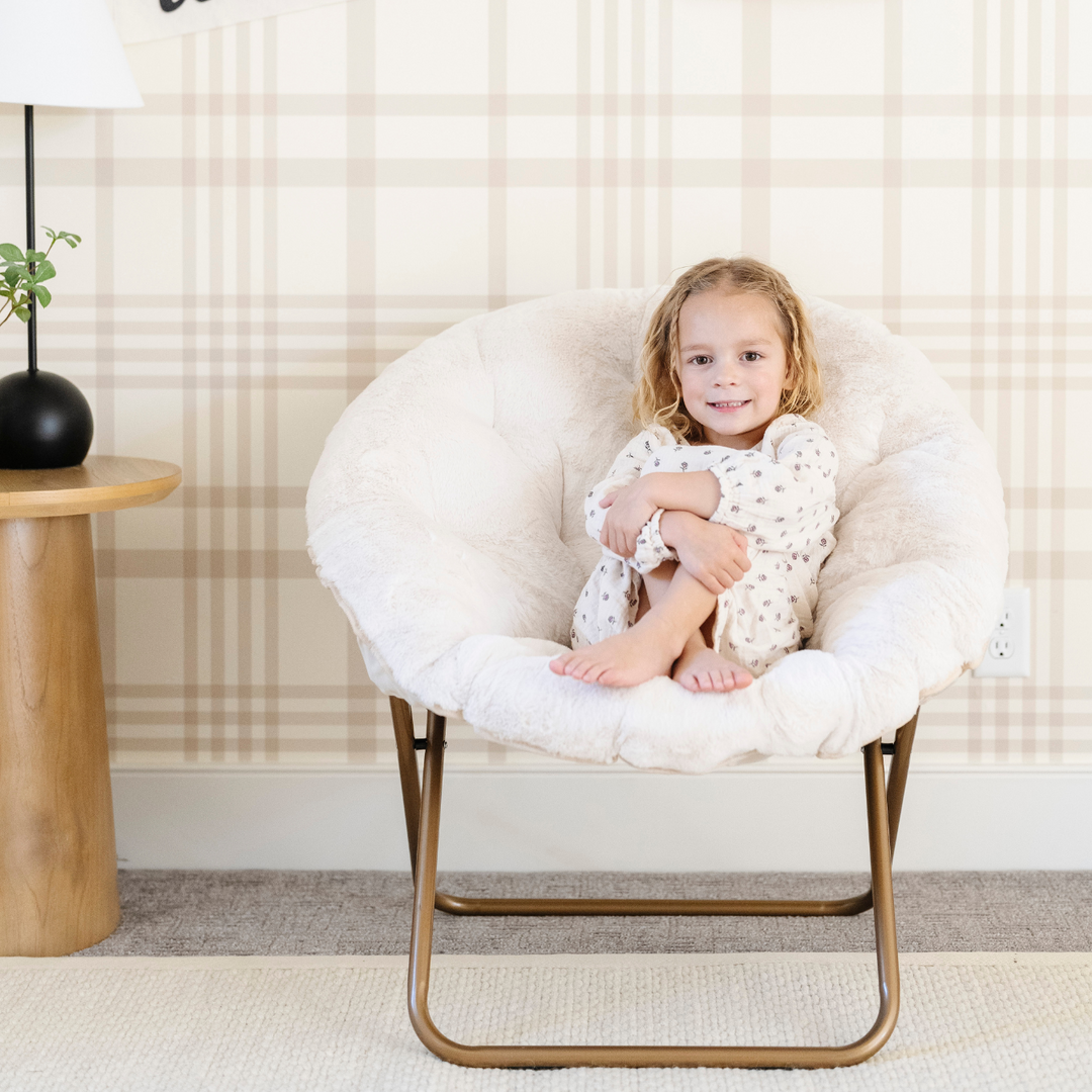 Cream Saranoni Saucer Chair offers a soft and fun lounger for kidsÕ relaxation.