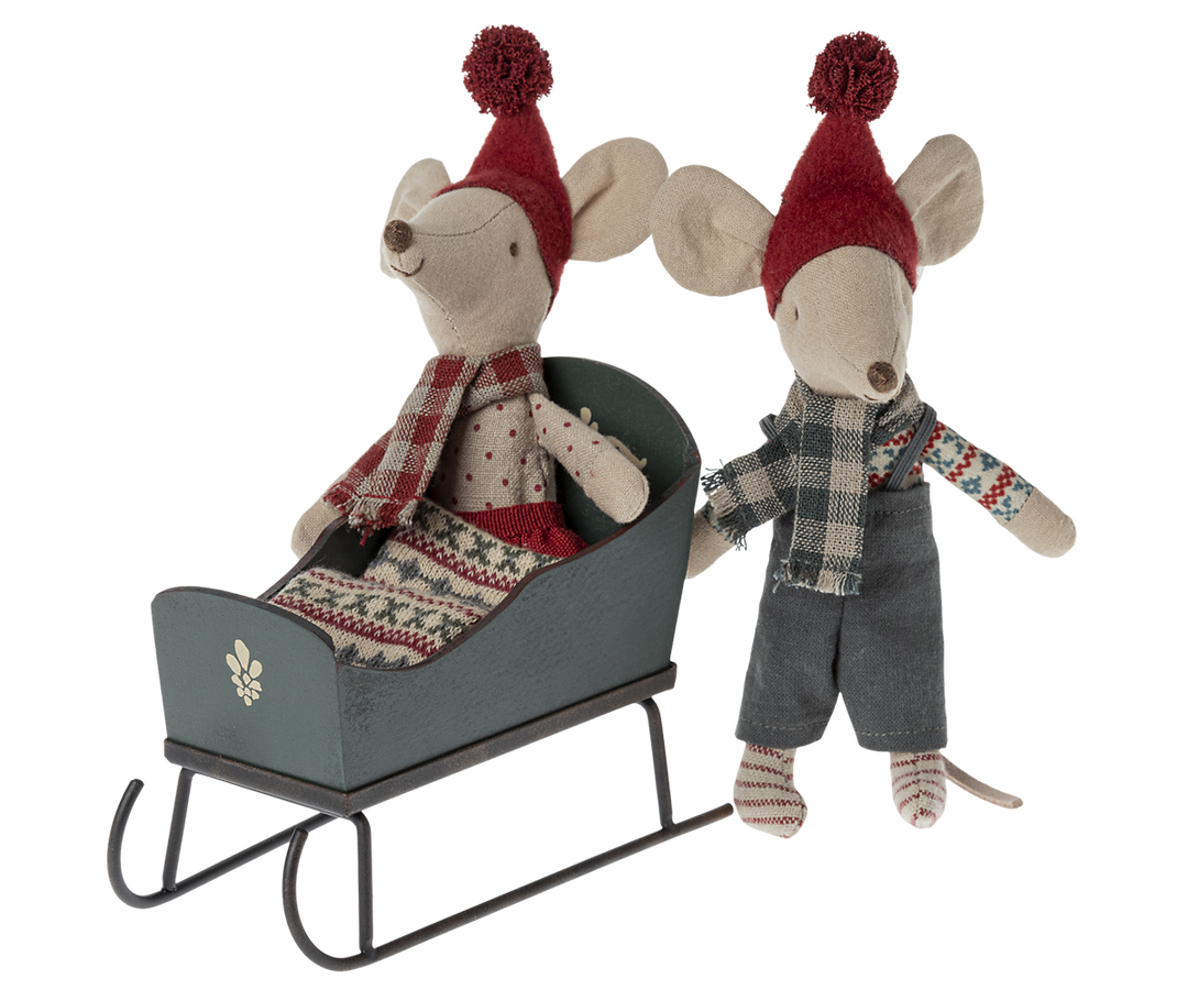 Close-up of Maileg Mouse Sleigh in Green with metal runners