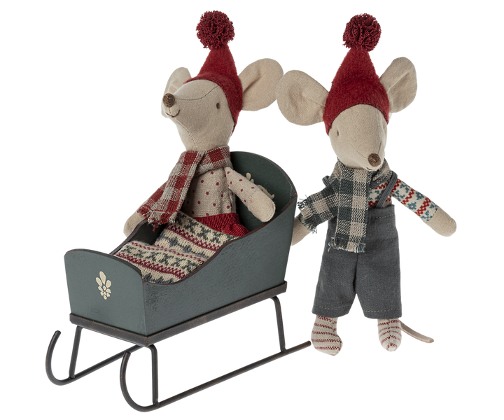 Close-up of Maileg Mouse Sleigh in Green with metal runners